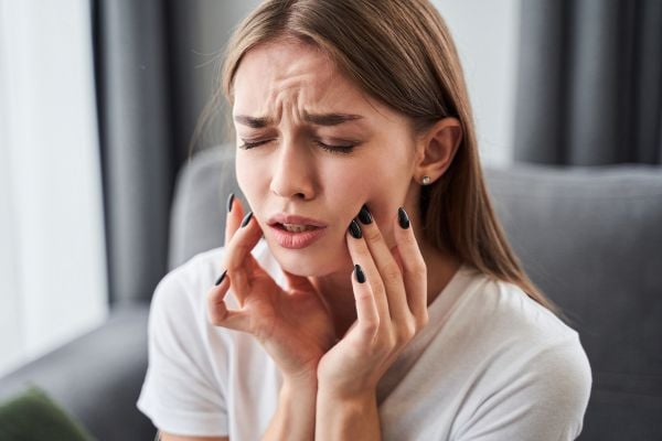 Image of a girl with a toothache