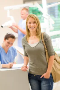smiling woman at desk